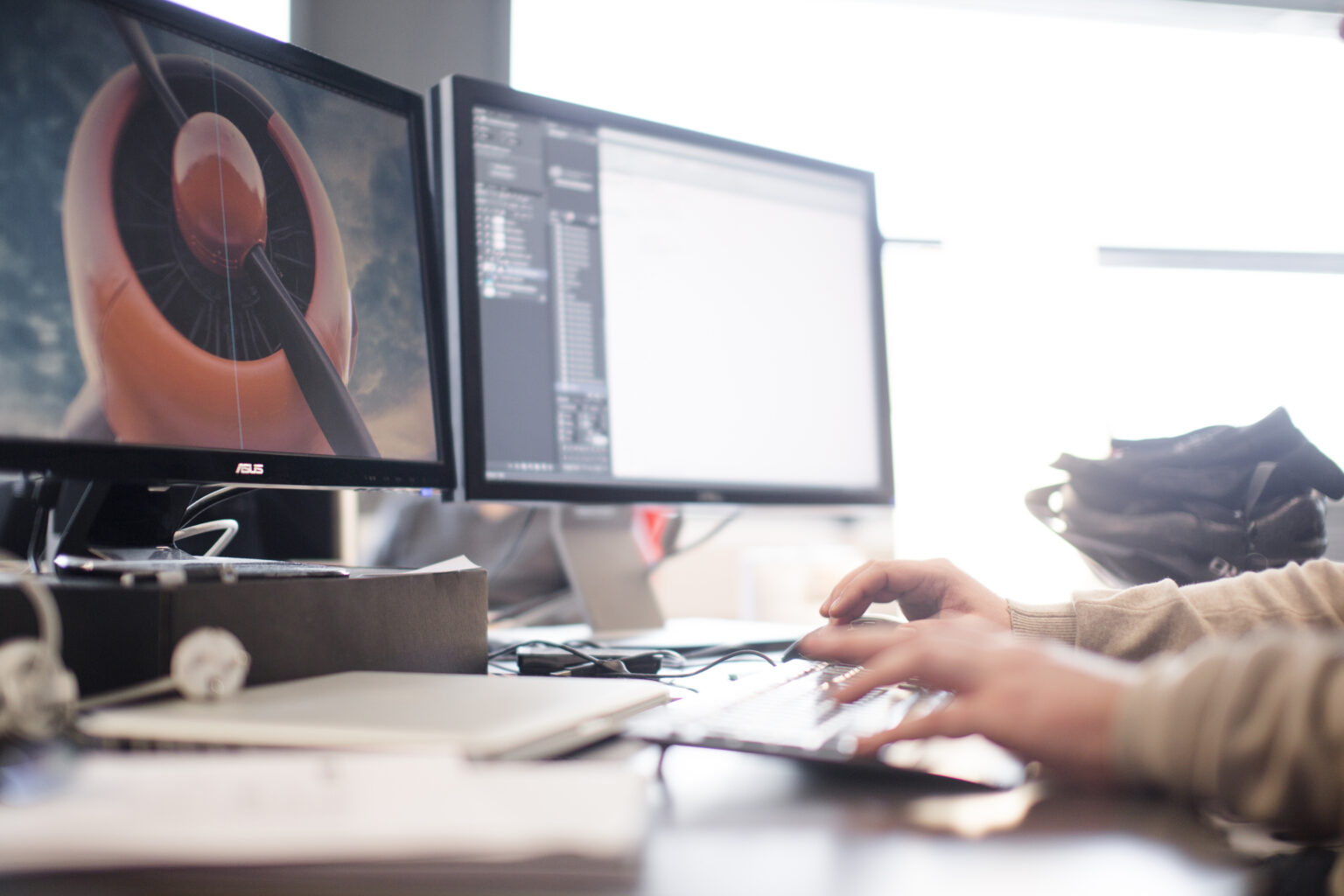 A person is working with computers.