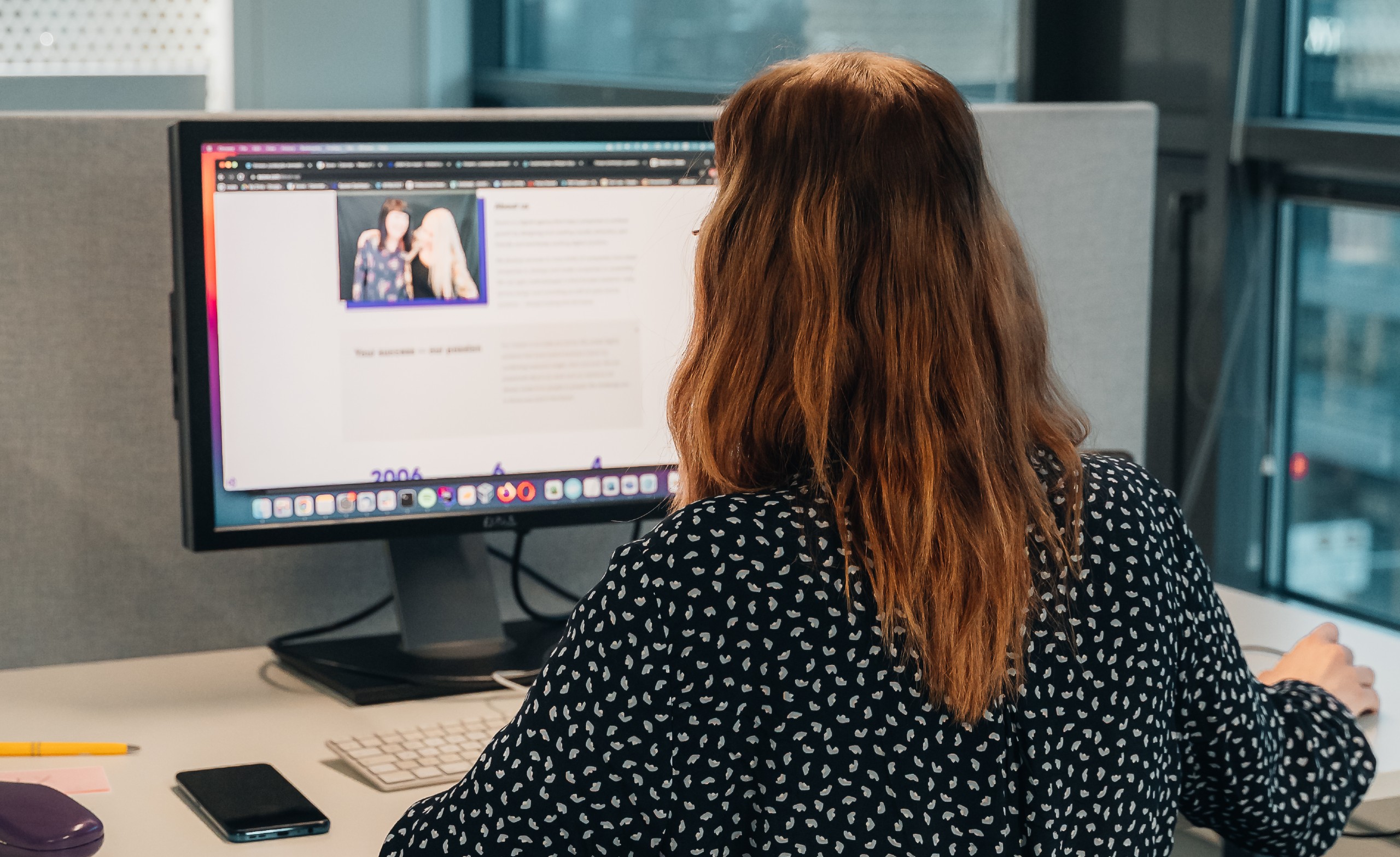 A person is working on computer.