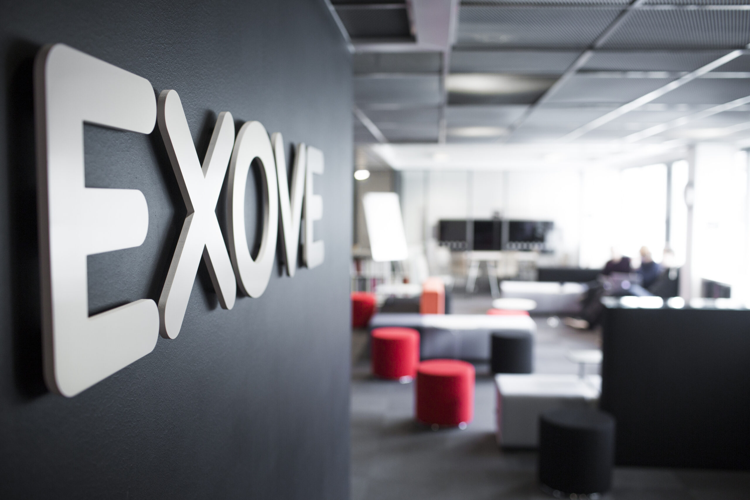 Exove logo on the wall.