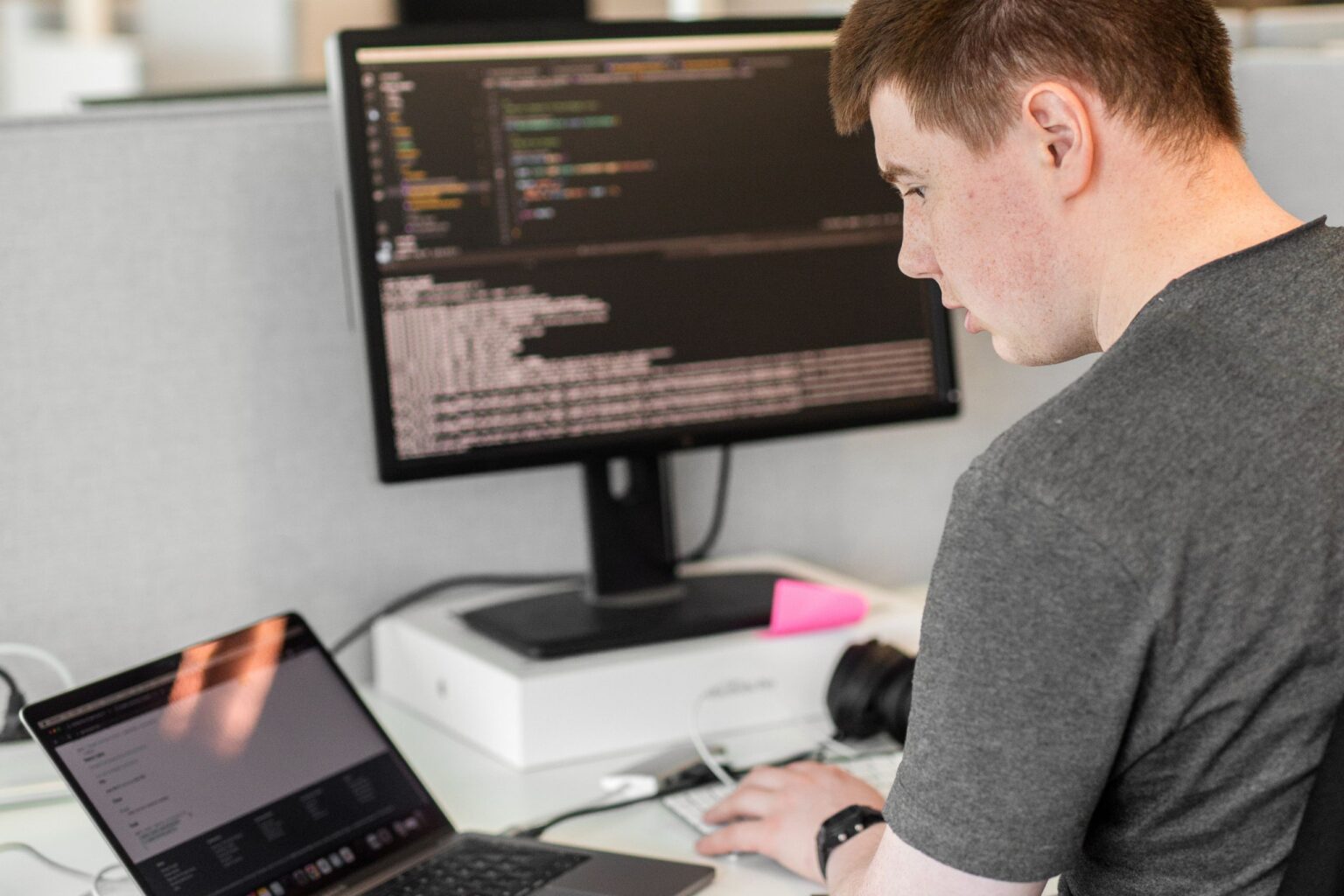 A person is coding.